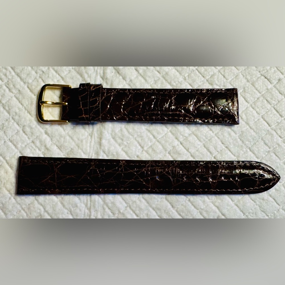 Genuine 18 mm Brown Crocodile Watch band with gold tone buckle.